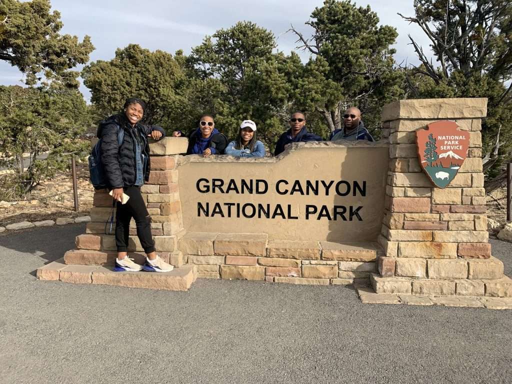 group photo with Grand Canyon National Park sign